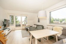 Wohn-/Essbereich Kapitalanlage in Braunlage: Gewerblich vermietete Ferienwohnung mit S�dloggia und Garage