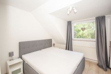 Schlafzimmer I Kapitalanlage in Braunlage: Gewerblich vermietete Ferienwohnung mit S�dloggia und Garage