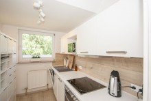 K�che Kapitalanlage in Braunlage: Gewerblich vermietete Ferienwohnung mit S�dloggia und Garage