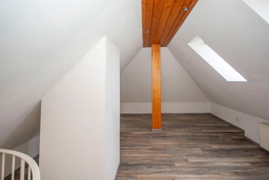 Zimmer II Dachgeschosswohnung Goslar / Ohlhof