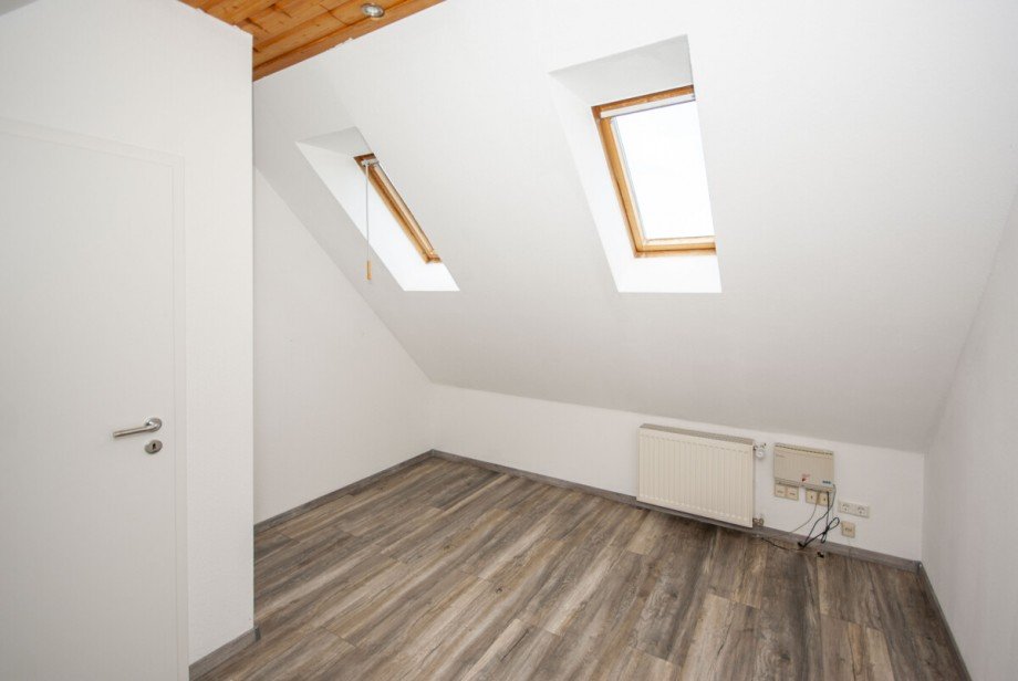 Zimmer III Dachgeschosswohnung Goslar / Ohlhof